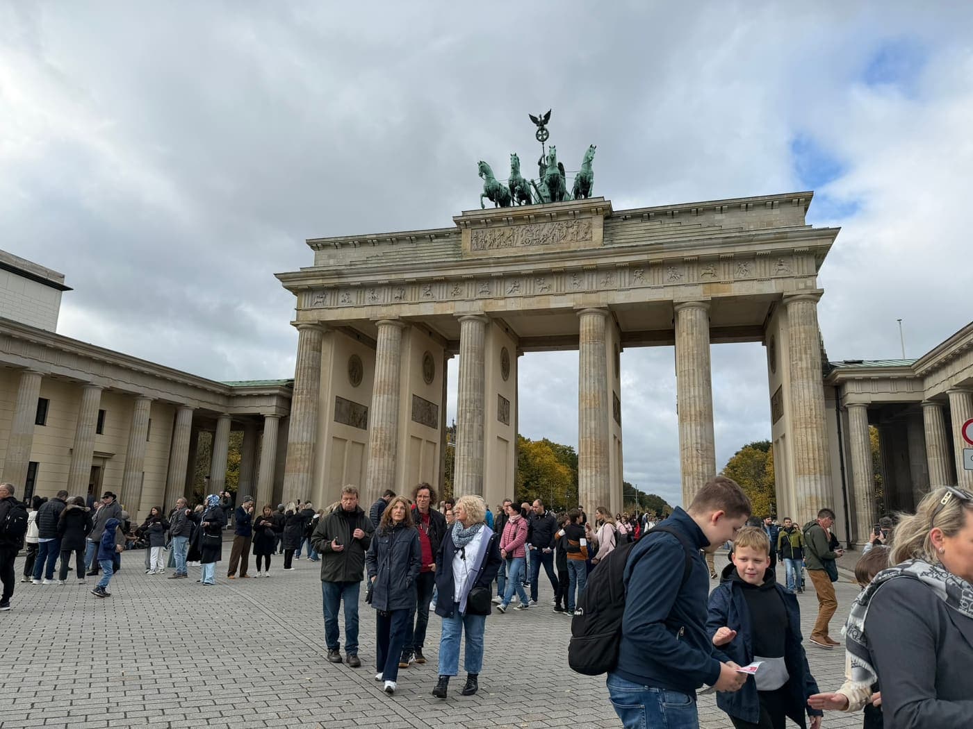 The Brandenburg Gate in Berlin under a grey autumn sky