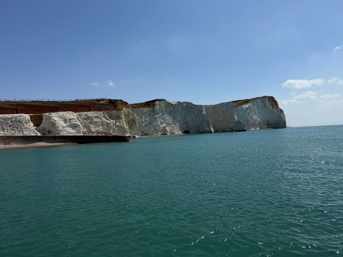 The white chalk cliffs of the Seven Sisters seen from the sea